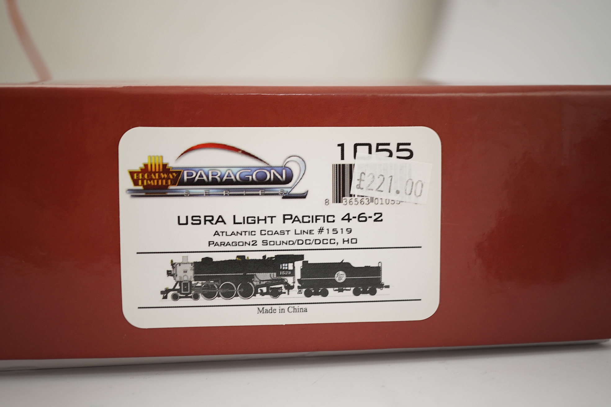 A boxed HO gauge Broadway Limited Paragon 2 Series (1055) model of Atlantic Coast Line 1519, 4-6-2 locomotive with bogie tender, powered for two rail operation.